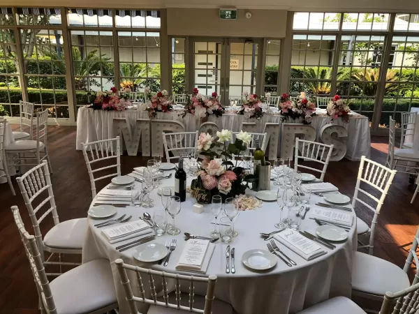 White tiffany chairs with white cushions