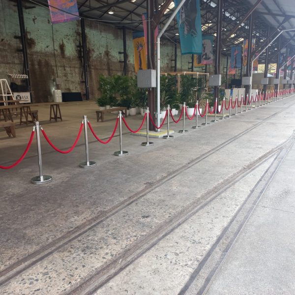 Red rope with silver bollard