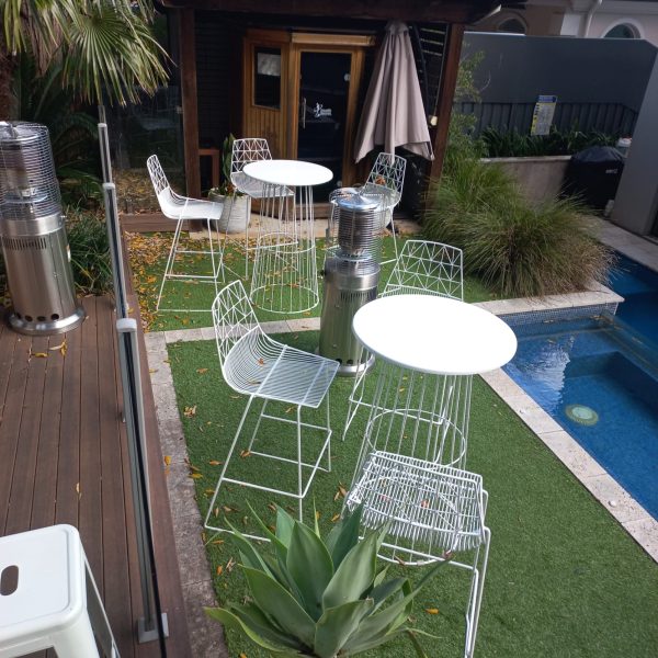 white wire cocktail table, white wire stool and area heater