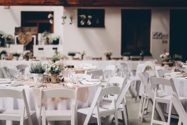 white padded folding chair