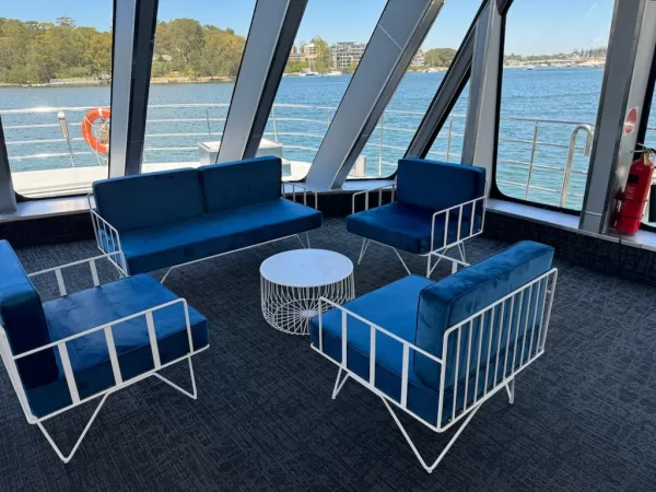 navy blue wire arm chair and navy blue wire sofa lounge with white wire coffee hire