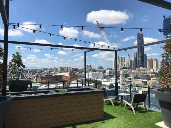 festoon lights on a roof top venue hanging