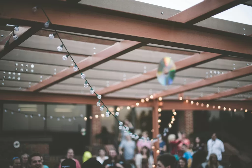 festoon lights hanging from roofing